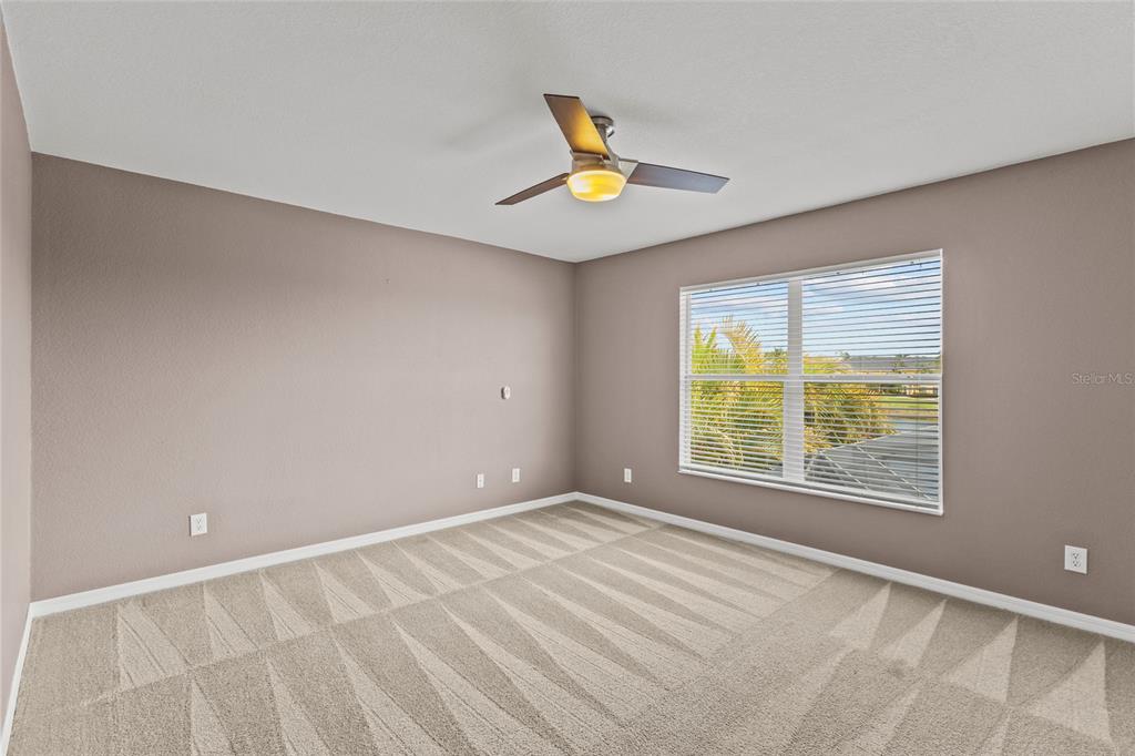 11754 Tempest Harbor Loop Venice, FL 34292 - Photo 22 of 56 a view of an empty room with a window