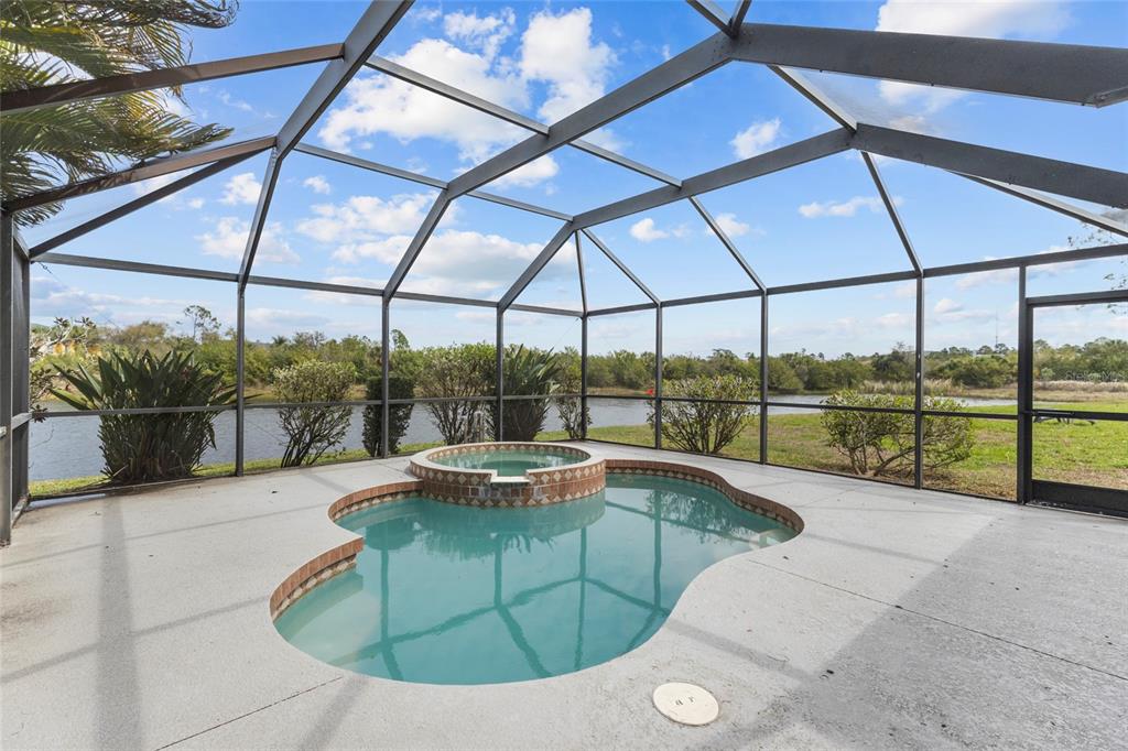 11754 Tempest Harbor Loop Venice, FL 34292 - Photo 29 of 56 a view of a swimming pool with a patio