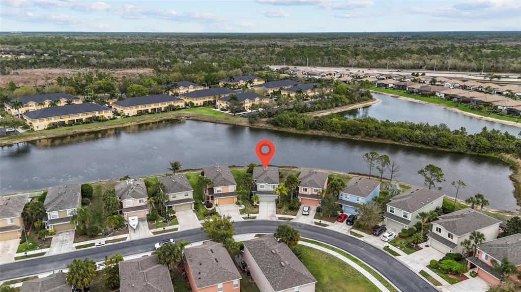11754 Tempest Harbor Loop Venice, FL 34292 - Photo 44 of 56 an aerial view of residential houses with outdoor space