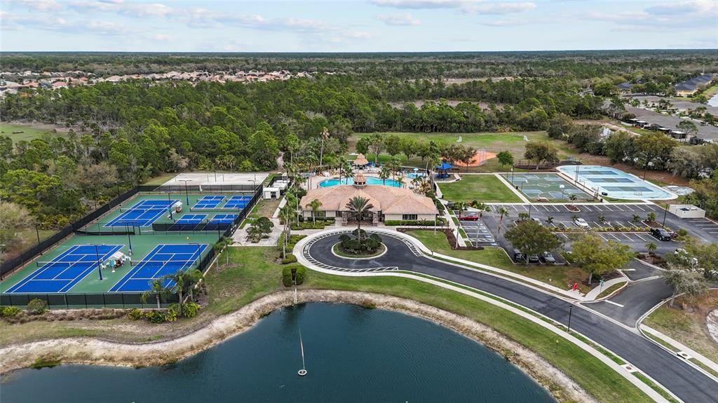 11754 Tempest Harbor Loop Venice, FL 34292 - Photo 47 of 56 an aerial view of residential houses with outdoor space