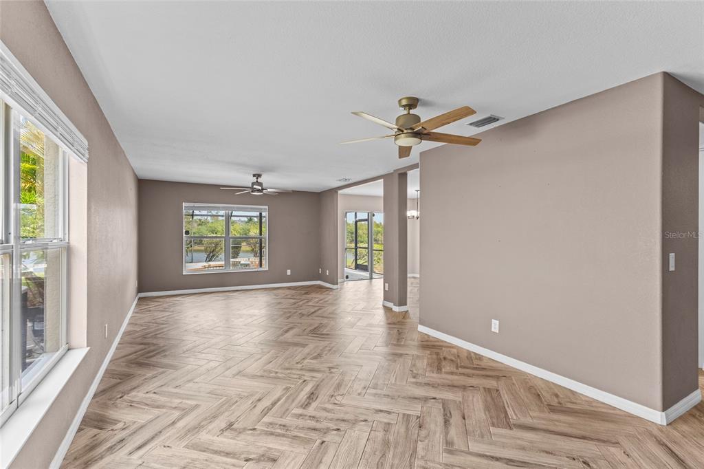 11754 Tempest Harbor Loop Venice, FL 34292 - Photo 5 of 56 a view of an empty room with a window
