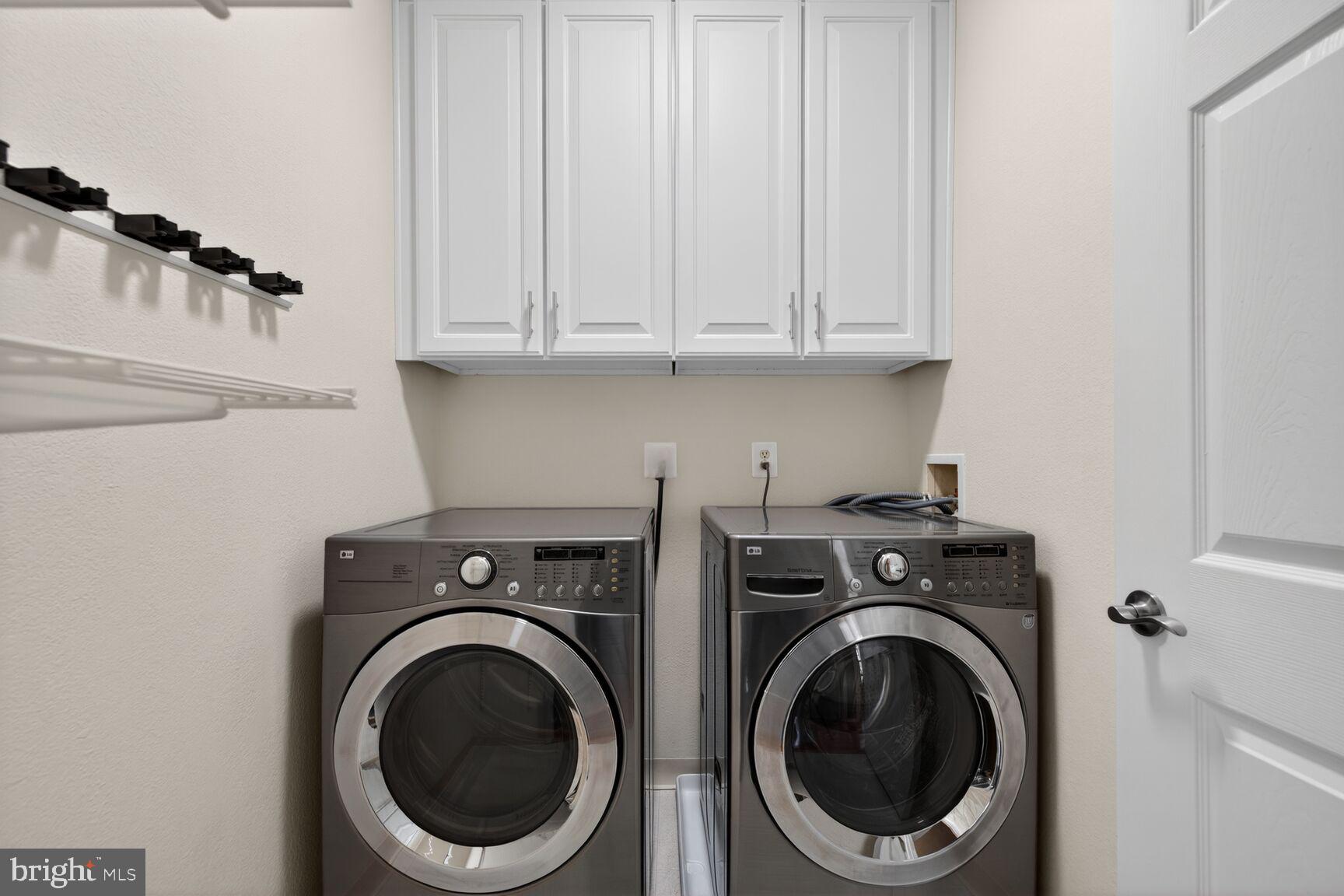 11800 Old Georgetown Road, Unit 1541 North Bethesda, MD 20852 - Photo 18 of 34 a utility room with dryer and washer
