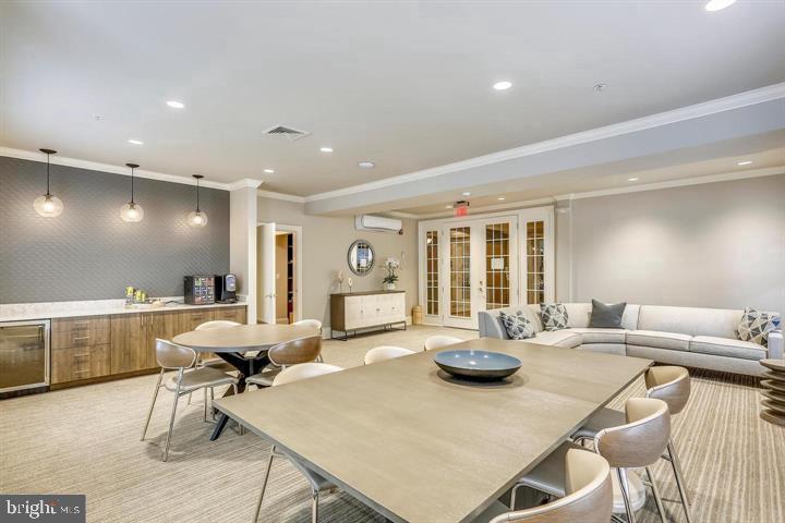 11800 Old Georgetown Road, Unit 1541 North Bethesda, MD 20852 - Photo 22 of 34 a living room with furniture and wooden floor