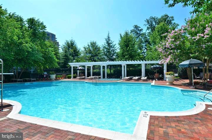 11800 Old Georgetown Road, Unit 1541 North Bethesda, MD 20852 - Photo 27 of 34 a view of house with backyard space and seating