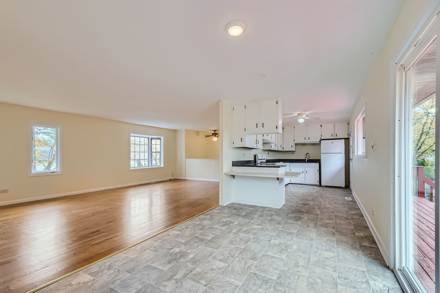 303 Audubon Road Streamwood, IL 60107 - Photo 11 of 30 a view of kitchen with wooden floor