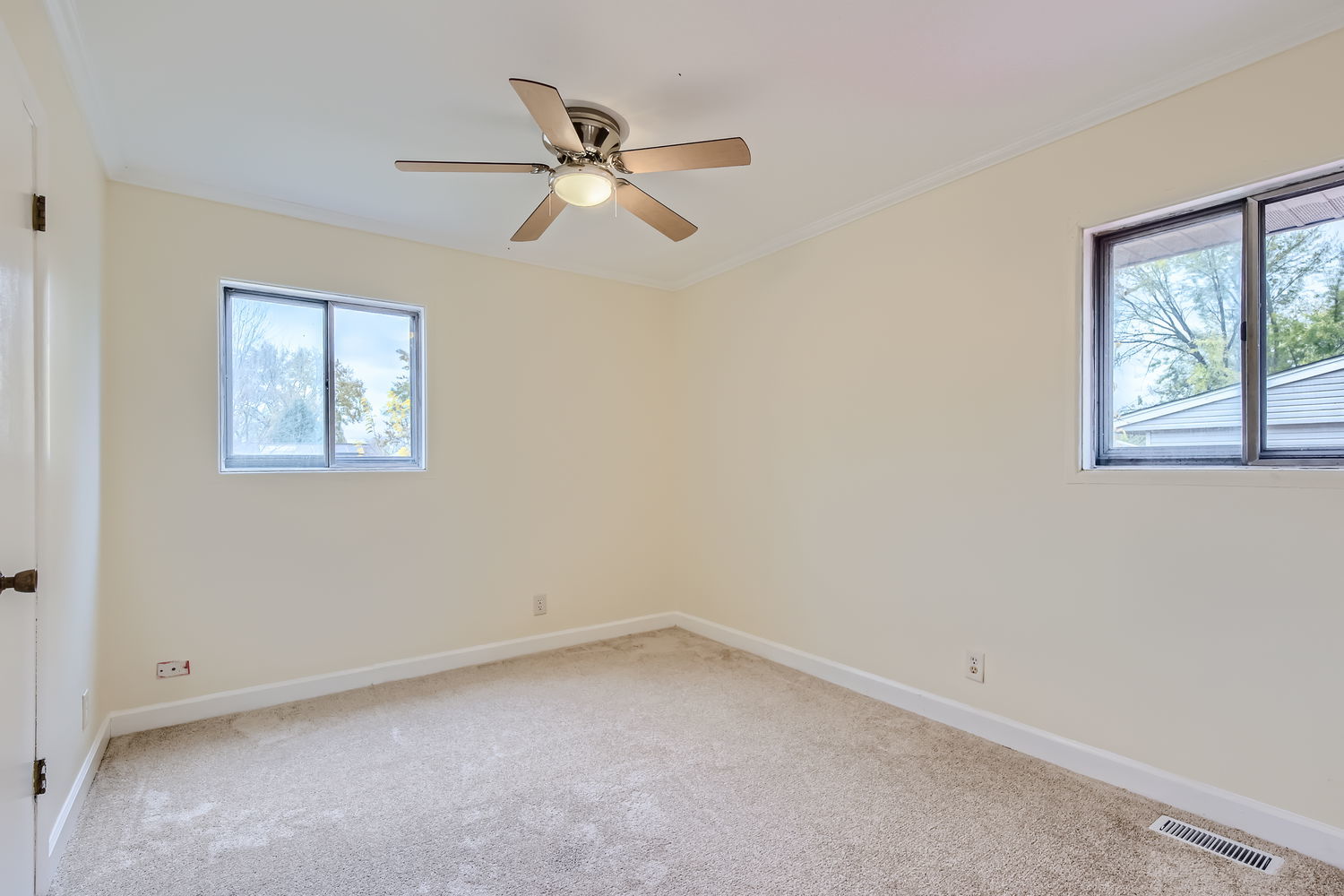 303 Audubon Road Streamwood, IL 60107 - Photo 12 of 30 a view of an empty room with a window