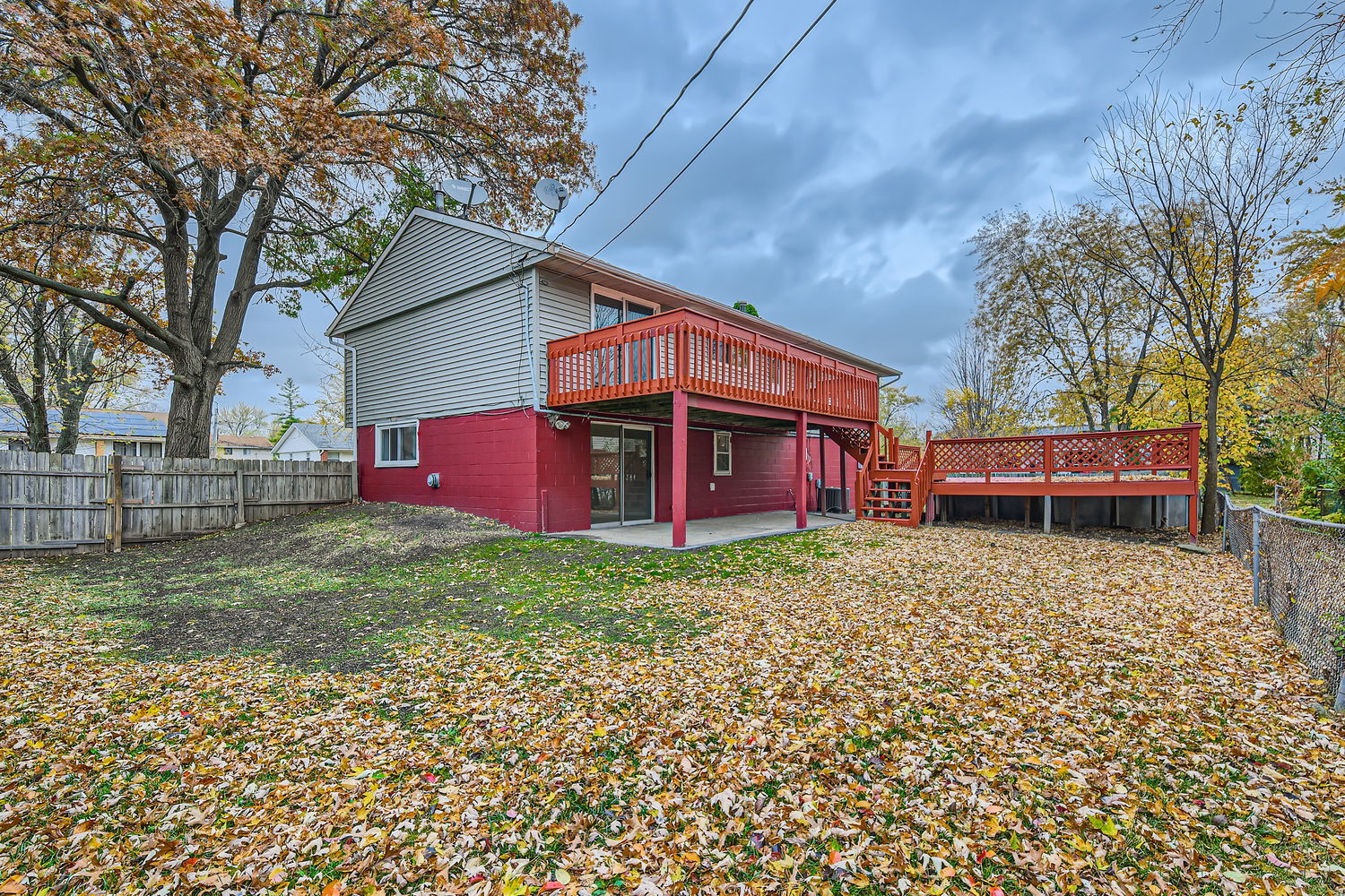 303 Audubon Road Streamwood, IL 60107 - Photo 26 of 30 a view of backyard of house with green space