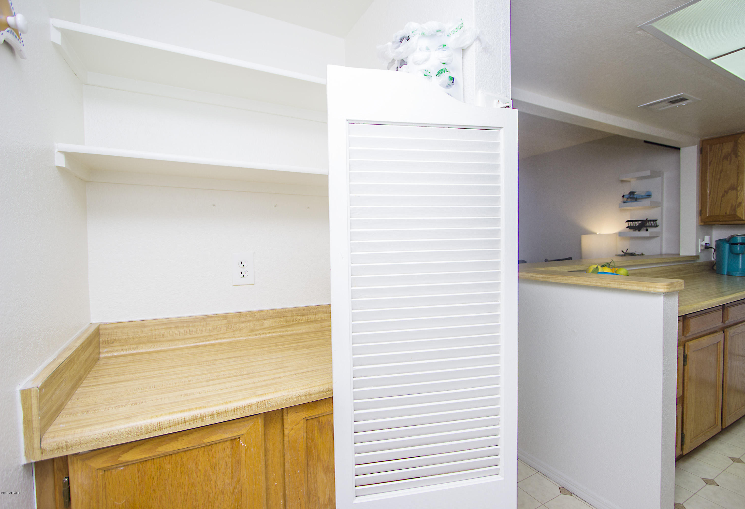 1645 West Baseline Road, Unit 2170 Mesa, AZ 85202 - Photo 8 of 26 Laundry or Pantry Shelves