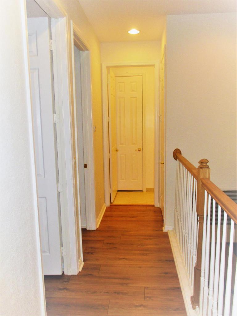 116 Lancaster Road Boynton Beach, FL 33426 - Photo 14 of 28 a view of a hallway with wooden floor