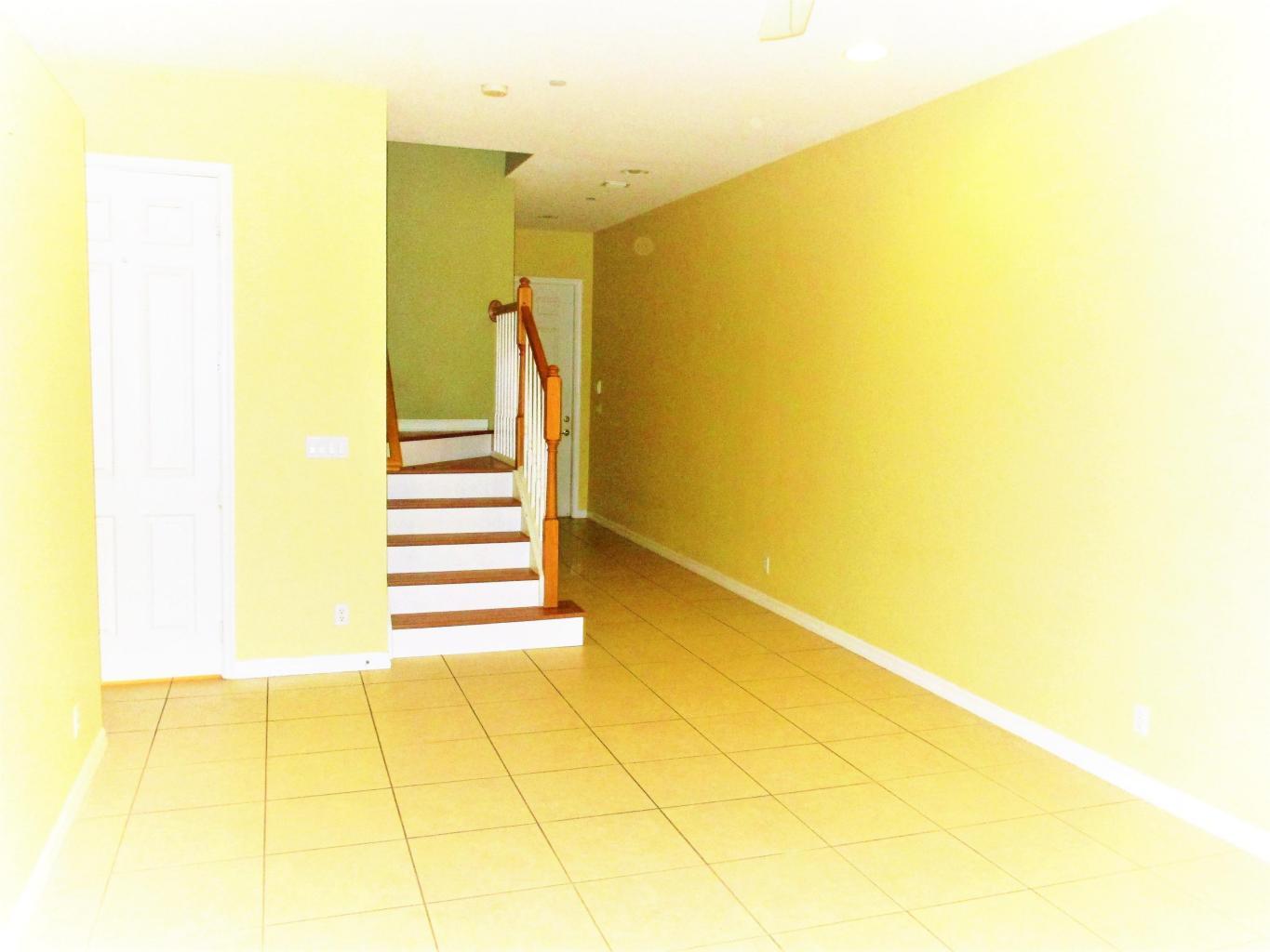 116 Lancaster Road Boynton Beach, FL 33426 - Photo 2 of 28 a view of a room with wooden floor