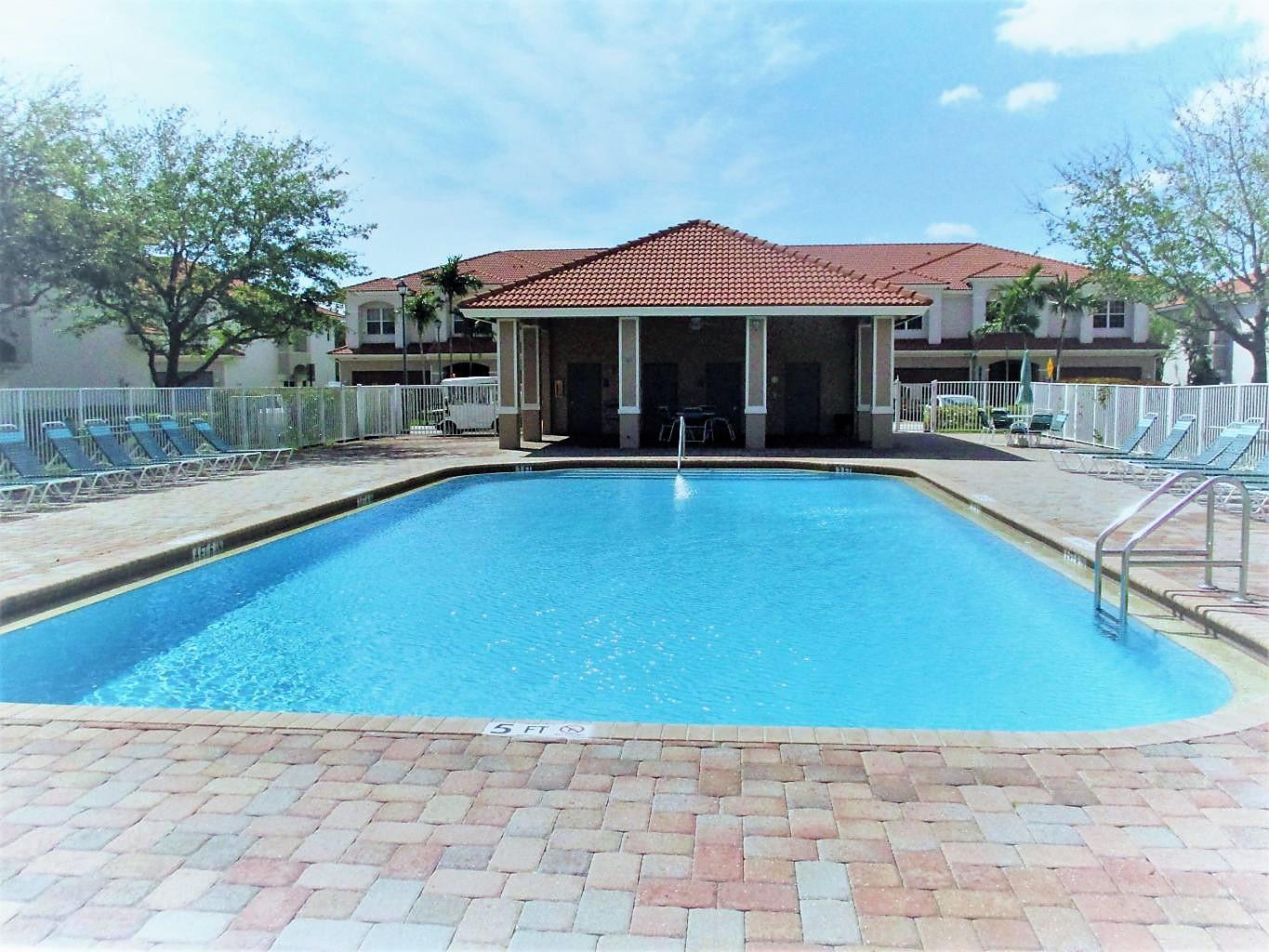 116 Lancaster Road Boynton Beach, FL 33426 - Photo 26 of 28 a view of pool with outdoor seating