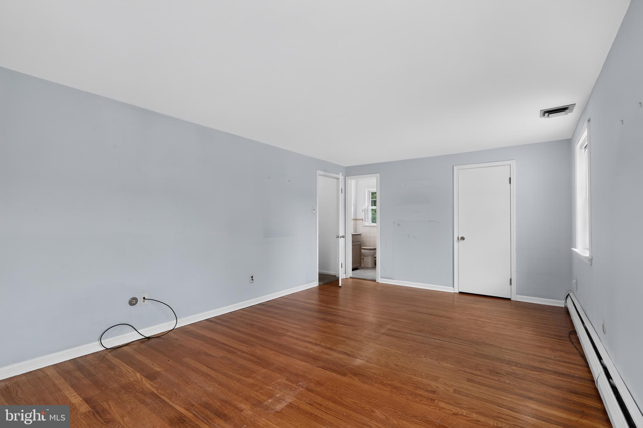 1408 Ponds Edge Road West Chester, PA 19382 - Photo 37 of 53 a view of empty room with wooden floor