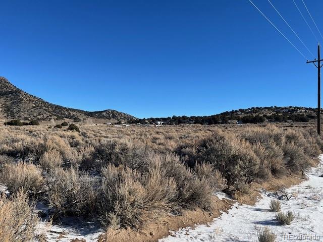549 Bateman Road Fort Garland, CO 81133 - Photo 2 of 11 a view of mountain view and mountain
