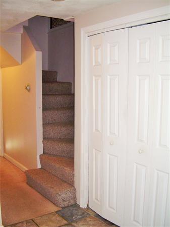 1 Anthony Road Peabody, MA 01960 - Photo 11 of 29 a view of staircase with white walls and white door