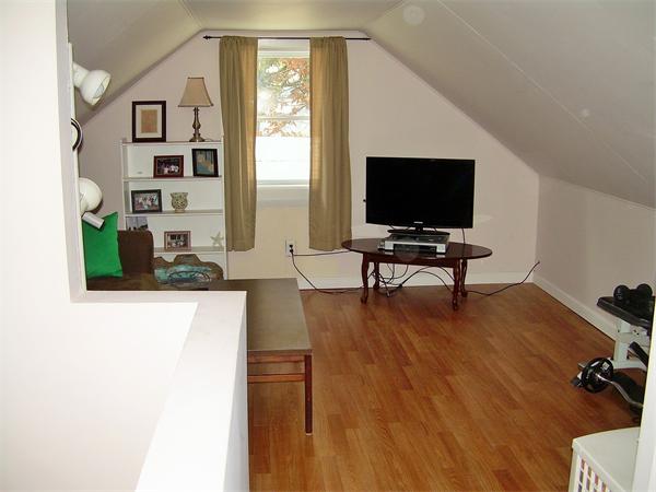 1 Anthony Road Peabody, MA 01960 - Photo 18 of 29 a living room with furniture and a flat screen tv