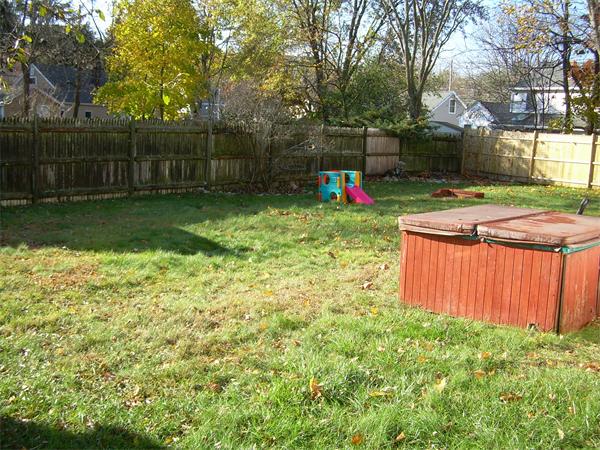 1 Anthony Road Peabody, MA 01960 - Photo 25 of 29 a view of a backyard with a trampoline