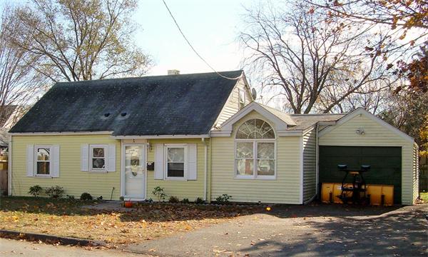 1 Anthony Road Peabody, MA 01960 - Photo 28 of 29 a front view of a house with a garage