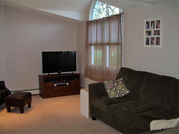 1 Anthony Road Peabody, MA 01960 - Photo 4 of 29 a living room with furniture and a flat screen tv