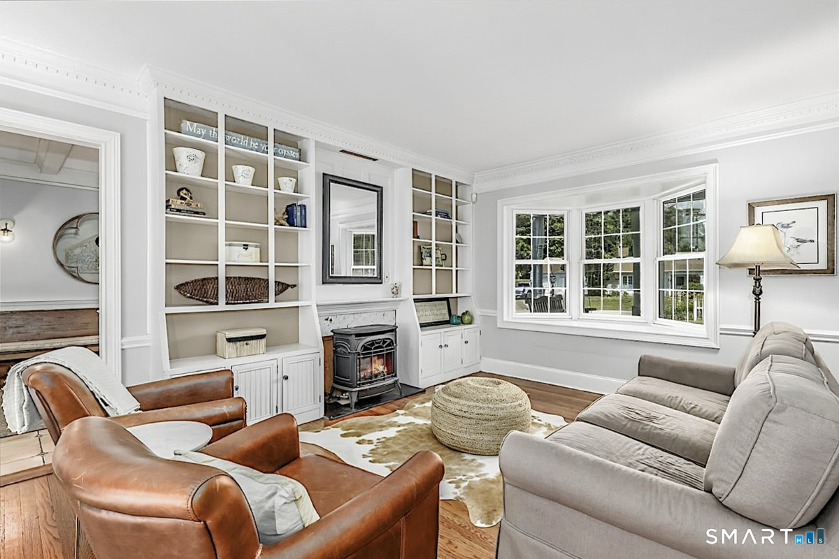 6 Elizabeth Street Newtown, CT 06470 - Photo 18 of 40 Custom Bookcases, Wood Stove and Bay Window are Amazing Features of this Main Floor