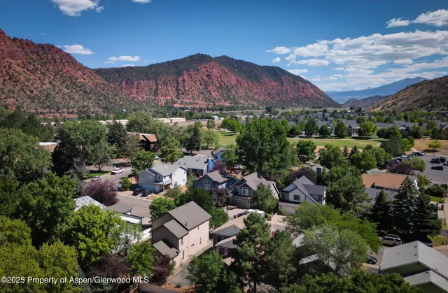 a view of a house with a mountain view