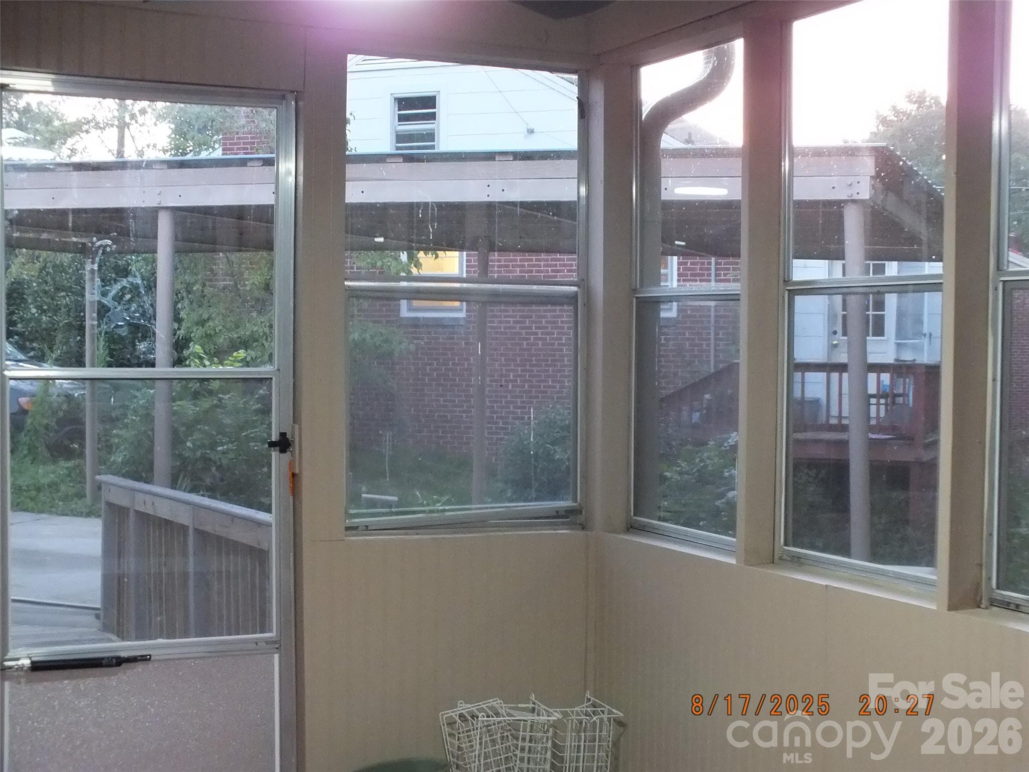 414 West Springs Street Lancaster, SC 29720 - Photo 21 of 22 a view of a glass door and a window