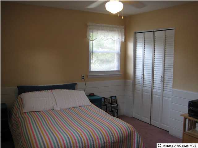70 Darien Road Howell, NJ 07731 - Photo 11 of 26 a bedroom with a bed and a window