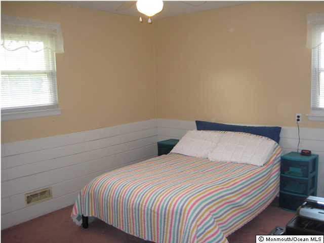 70 Darien Road Howell, NJ 07731 - Photo 12 of 26 a bedroom with a bed and a window
