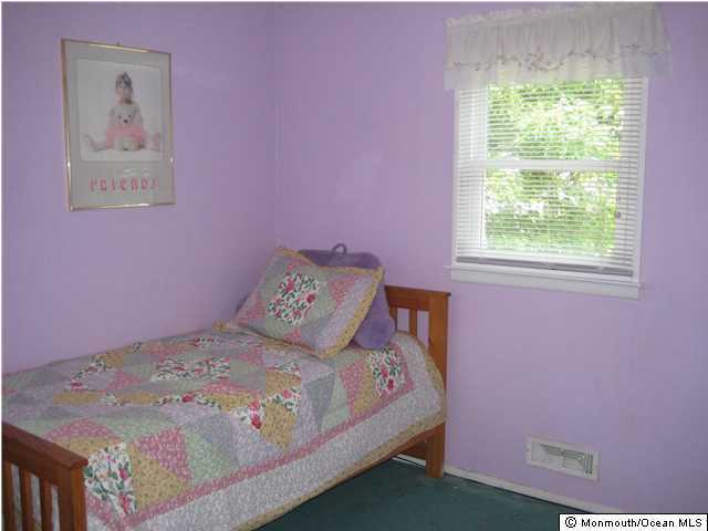 70 Darien Road Howell, NJ 07731 - Photo 13 of 26 a bedroom with a bed and a window