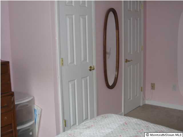 70 Darien Road Howell, NJ 07731 - Photo 16 of 26 a view of a bathroom with sink and mirror