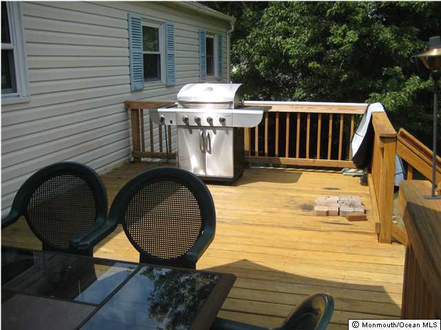 70 Darien Road Howell, NJ 07731 - Photo 20 of 26 a view of a balcony with chairs