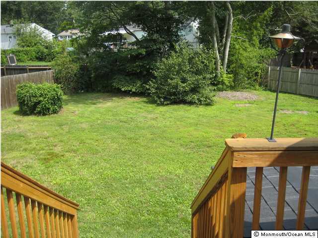 70 Darien Road Howell, NJ 07731 - Photo 21 of 26 a view of a backyard with plants
