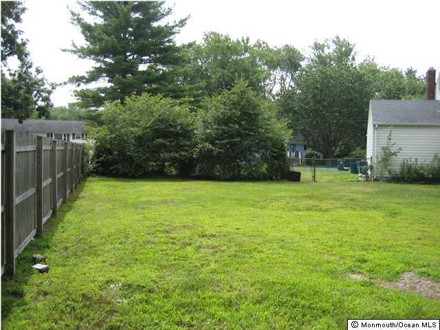 70 Darien Road Howell, NJ 07731 - Photo 22 of 26 a view of a backyard