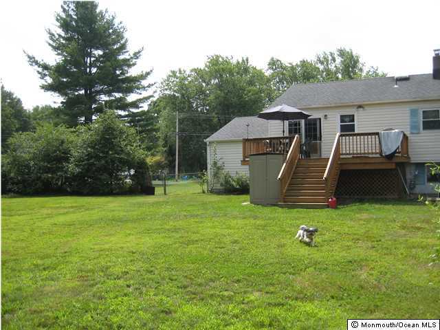 70 Darien Road Howell, NJ 07731 - Photo 23 of 26 a view of a house with backyard