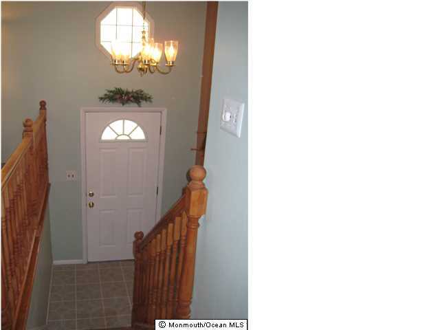 70 Darien Road Howell, NJ 07731 - Photo 9 of 26 a view of a hallway with stairs