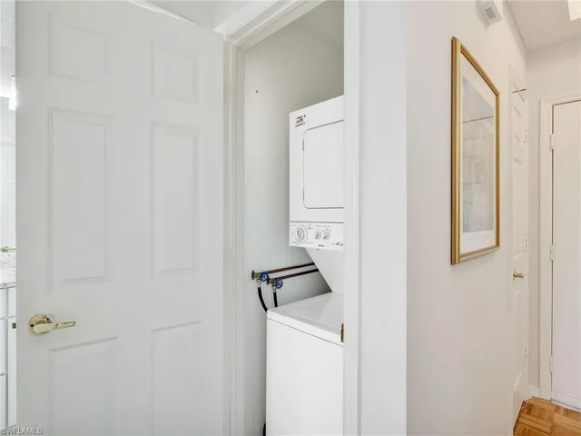 a view of storage and utility room with washer and dryer