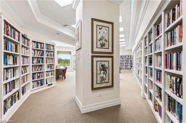 a view of room with furniture and book shelf