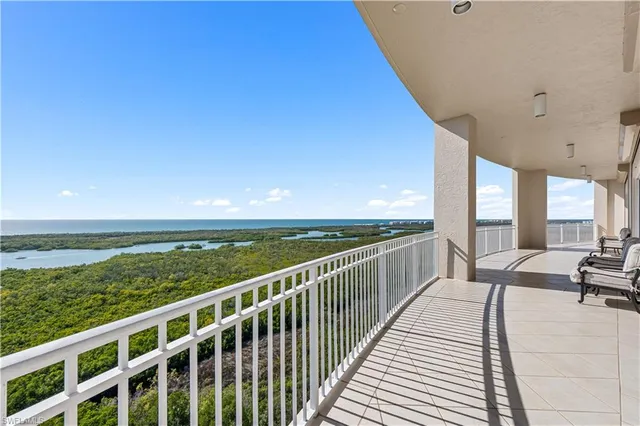 a view of balcony with couch and wooden floor