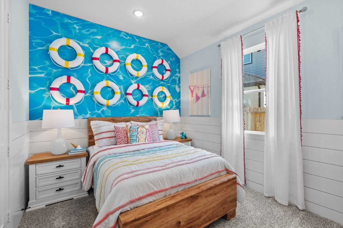 130 Afton June Drive Rosenberg, TX 77471 - Photo 17 of 36 a bedroom with a bed and a dresser