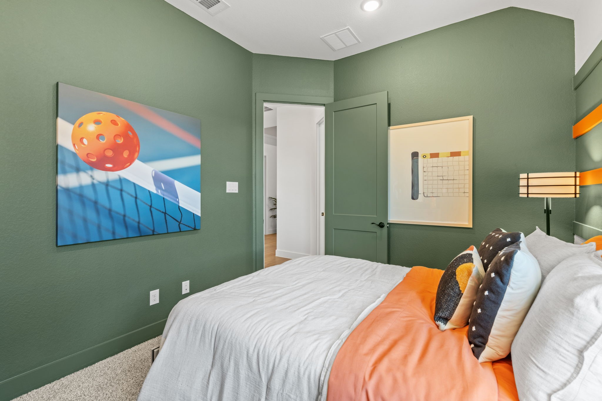 130 Afton June Drive Rosenberg, TX 77471 - Photo 20 of 36 a bedroom with a bed and a painting on the wall