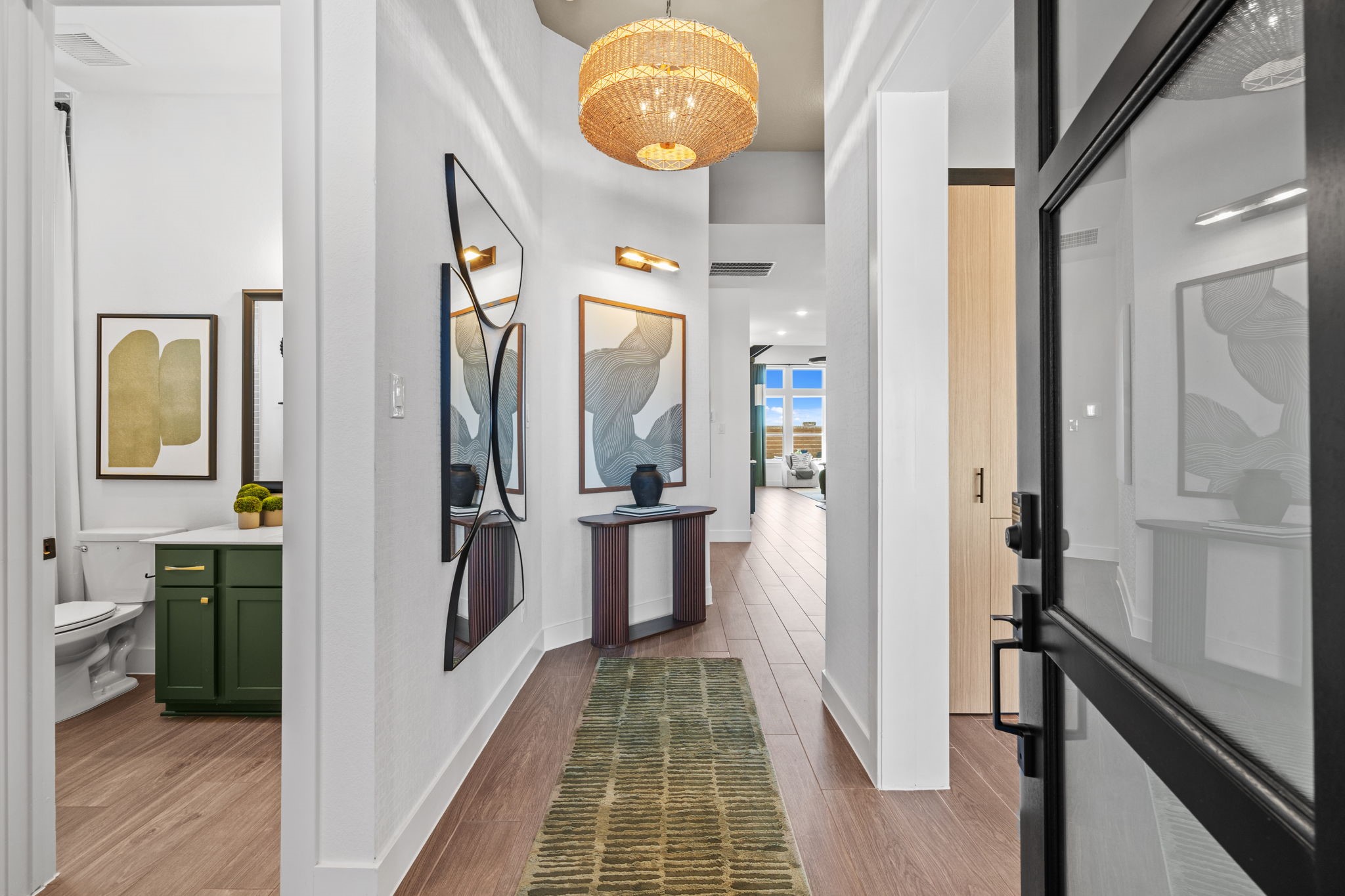 130 Afton June Drive Rosenberg, TX 77471 - Photo 2 of 36 a view of a hallway with wooden floor and entryway