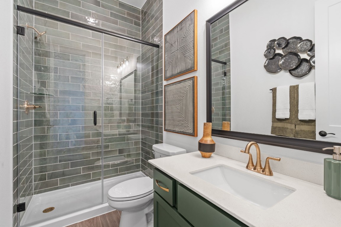 130 Afton June Drive Rosenberg, TX 77471 - Photo 21 of 36 a bathroom with a sink a toilet and shower