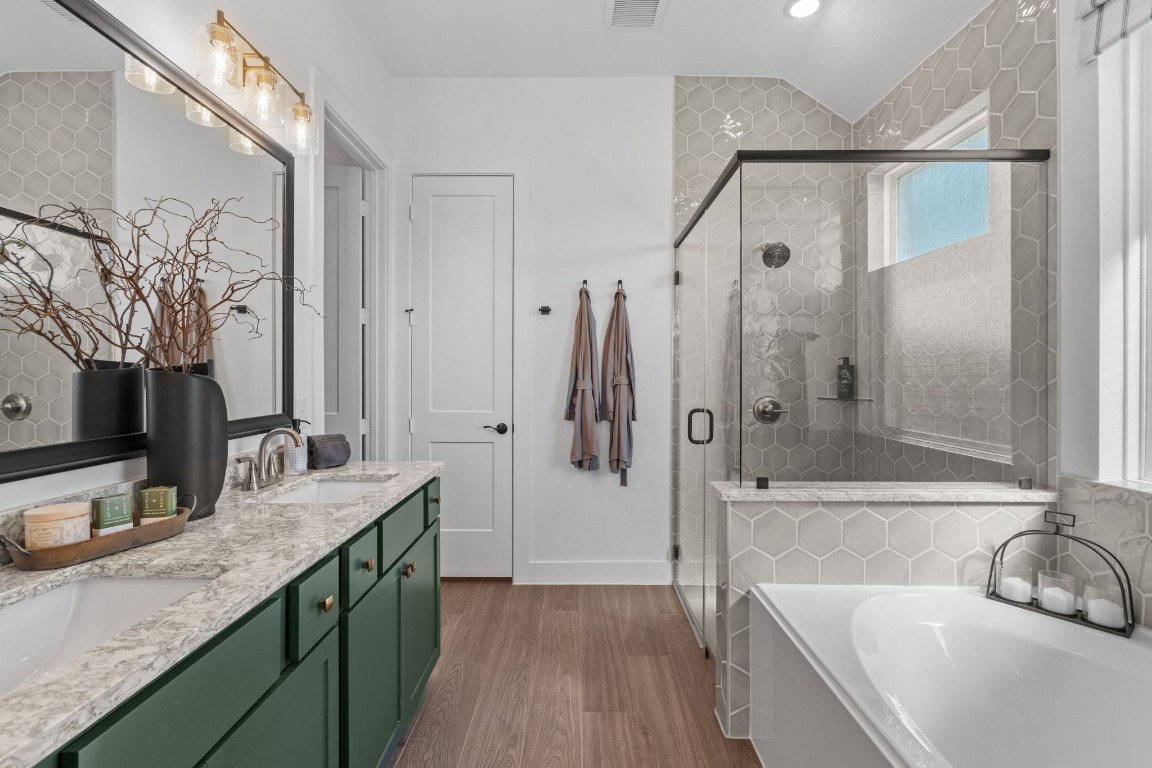 130 Afton June Drive Rosenberg, TX 77471 - Photo 29 of 36 a bathroom with a granite countertop tub sink and mirror