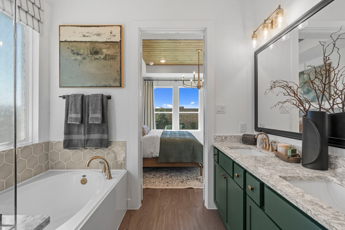 130 Afton June Drive Rosenberg, TX 77471 - Photo 30 of 36 a bathroom with a tub sink and mirror