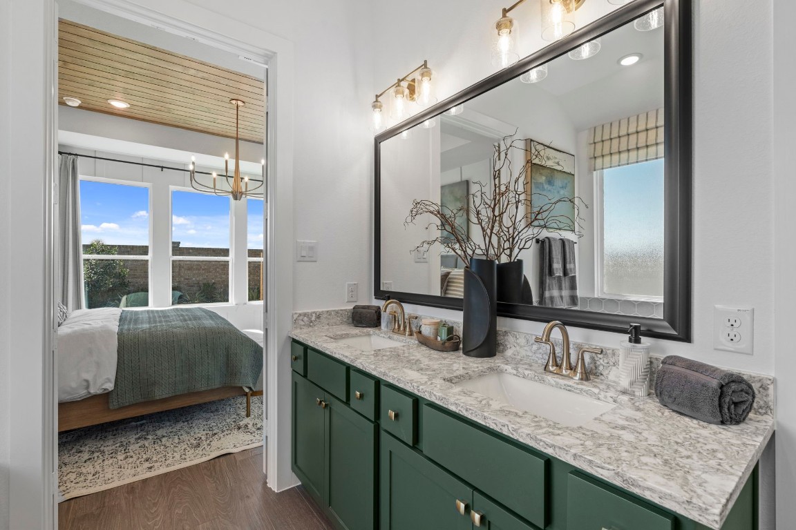 130 Afton June Drive Rosenberg, TX 77471 - Photo 31 of 36 a en suite bathroom with a granite countertop sink and a mirror