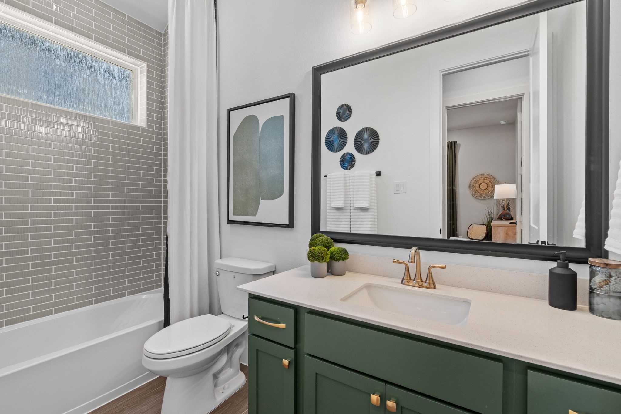 130 Afton June Drive Rosenberg, TX 77471 - Photo 6 of 36 a bathroom with a sink toilet a mirror and shower