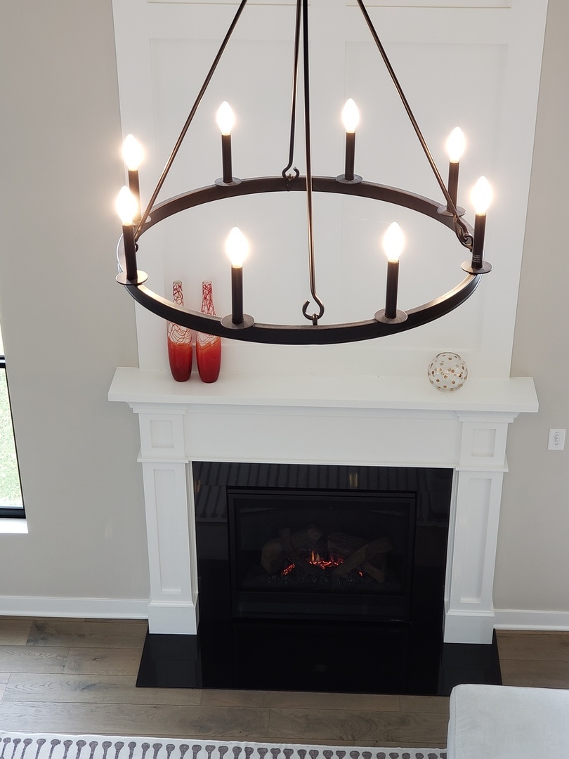 4327 Carpenter Road Naperville, IL 60564 - Photo 11 of 42 a view of entryway and hall with a fireplace