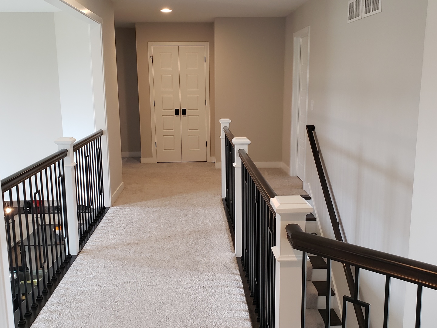 4327 Carpenter Road Naperville, IL 60564 - Photo 20 of 42 a view of a hallway with stairs