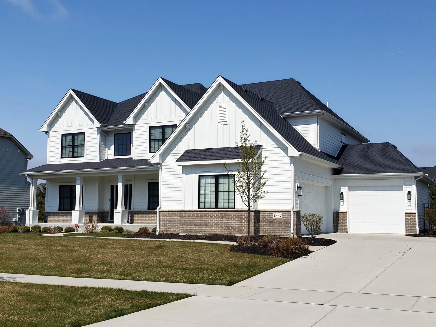 4327 Carpenter Road Naperville, IL 60564 - Photo 2 of 42 a front view of a house with garden