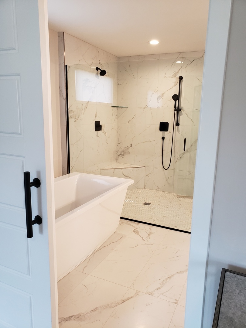 4327 Carpenter Road Naperville, IL 60564 - Photo 24 of 42 a bathroom with a shower