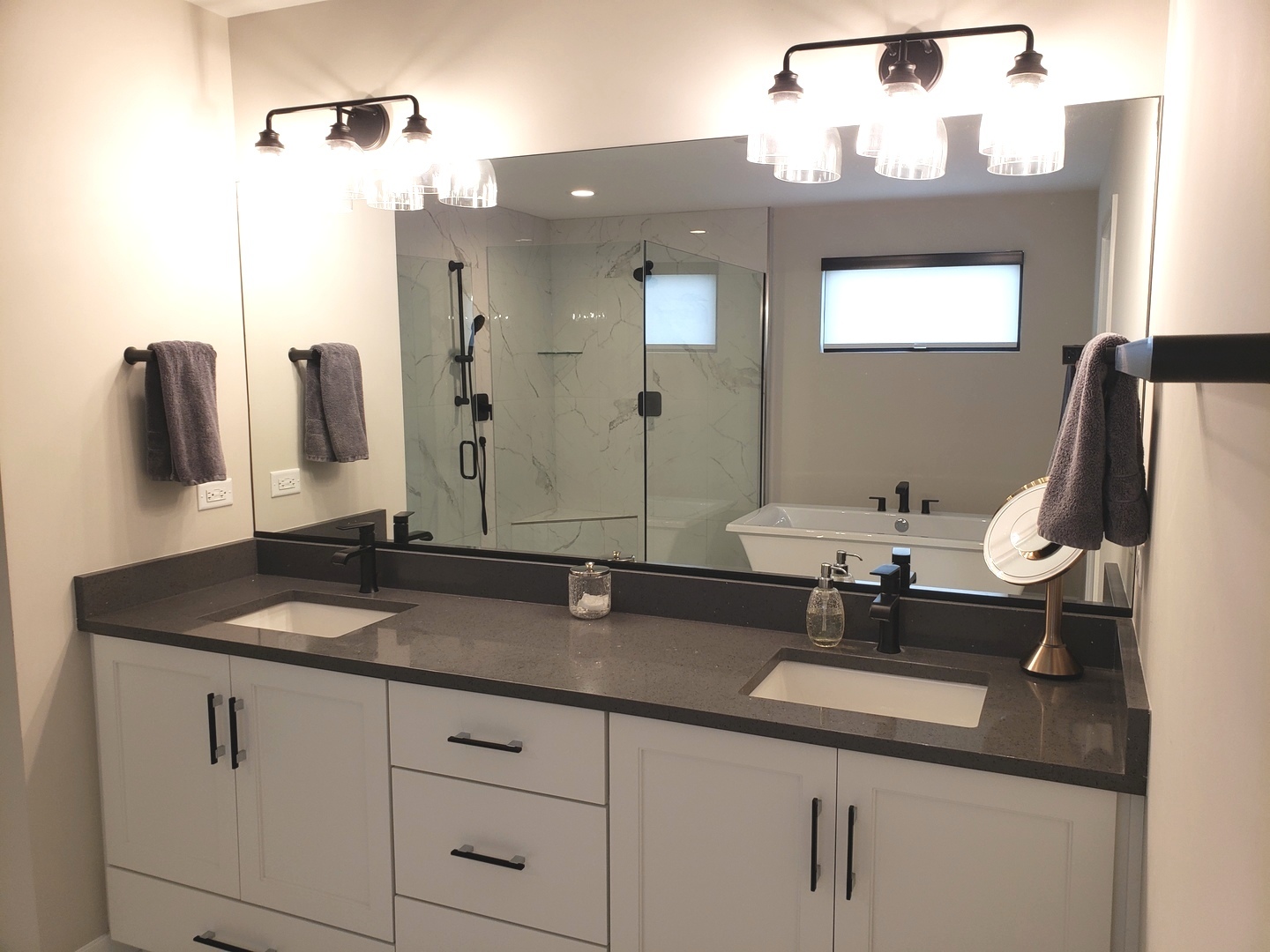 4327 Carpenter Road Naperville, IL 60564 - Photo 28 of 42 a bathroom with a sink and a mirror